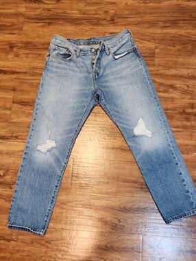 Levi's Light Blue Relaxed Fit Distressed Jeans
